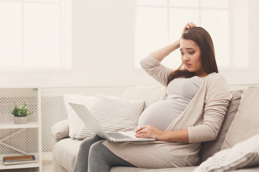 Pregnant Business Woman Remote Working At Home